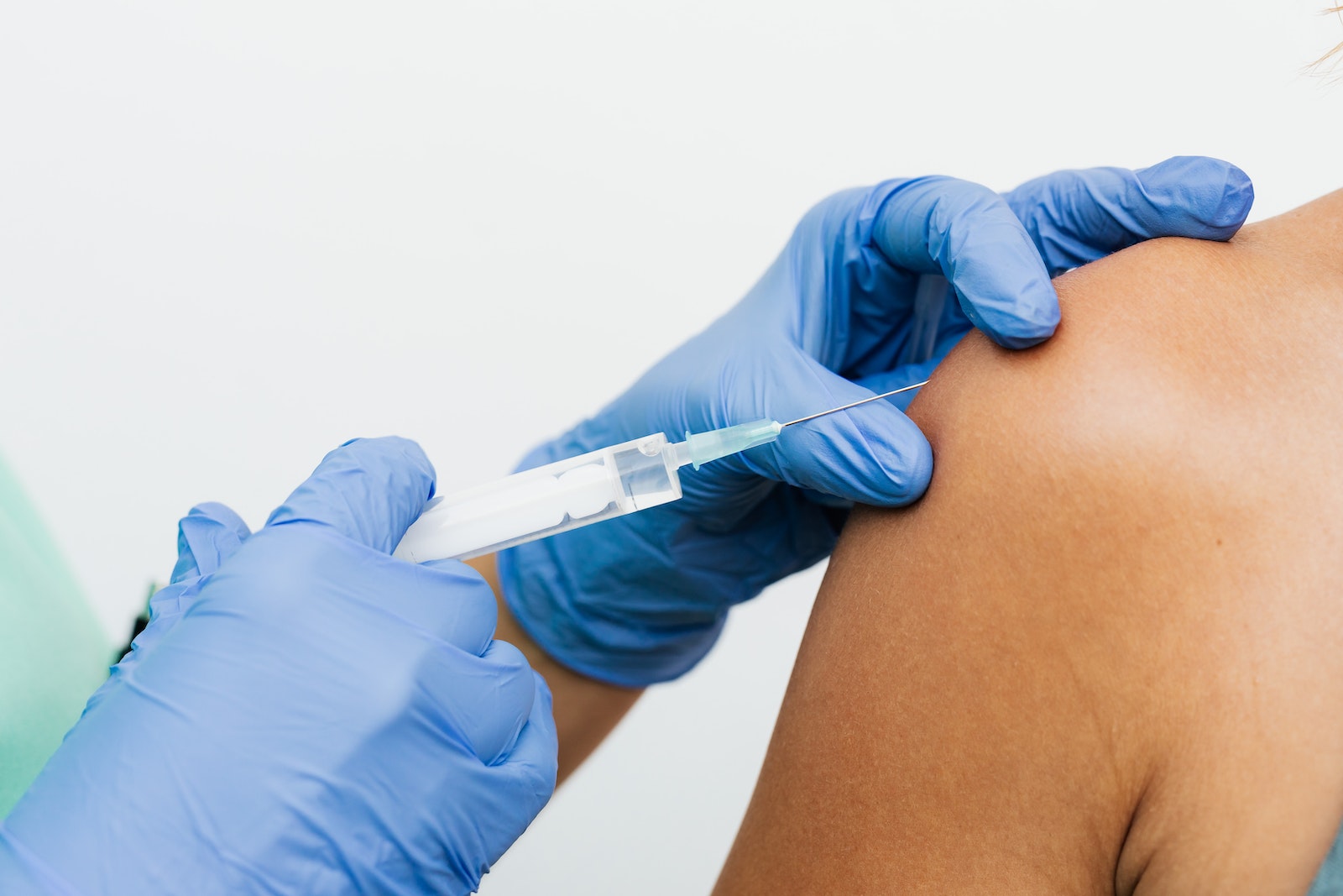 Injection on the Arm of a Person